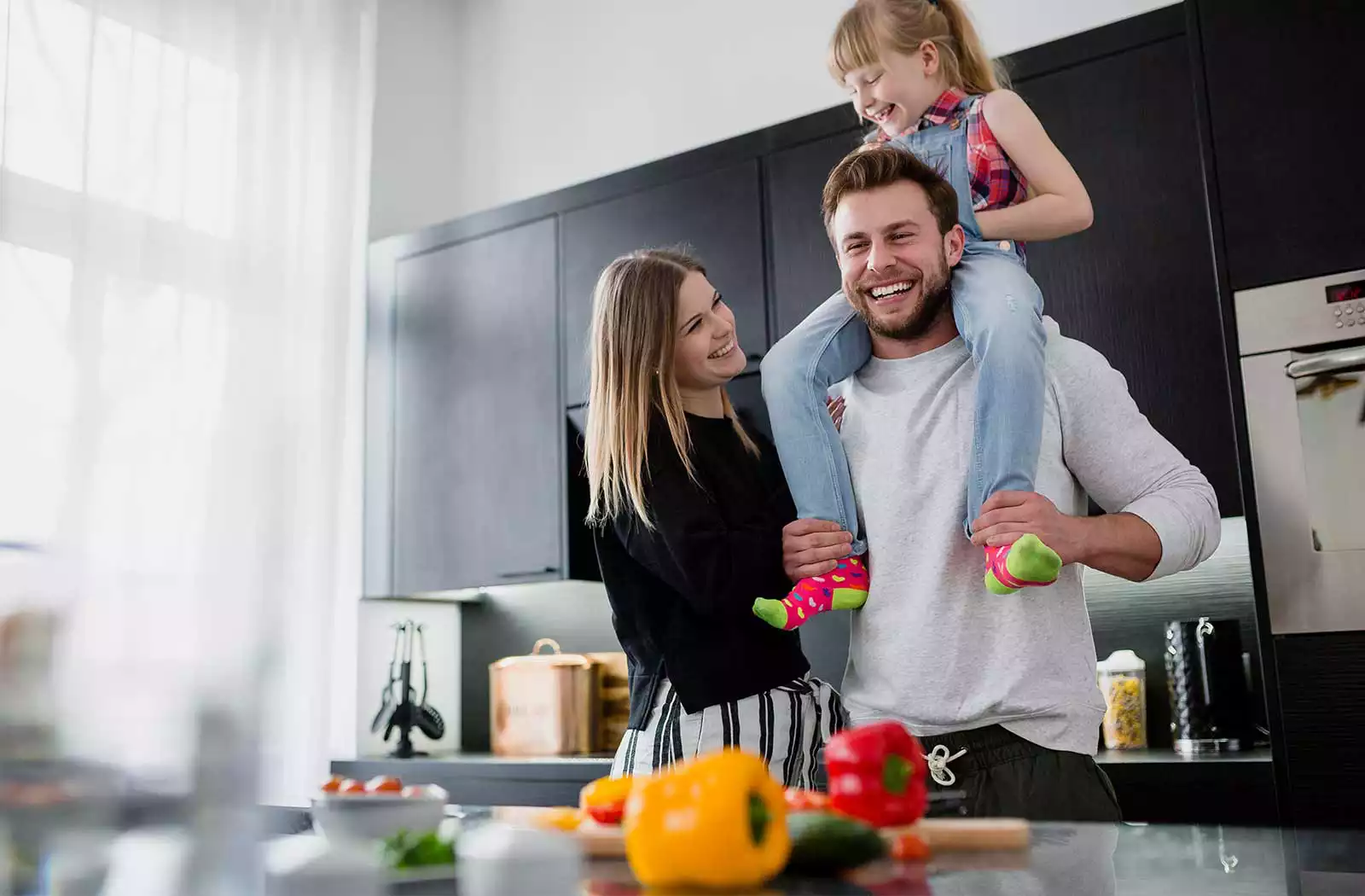 Happy Family in Kitchen Together